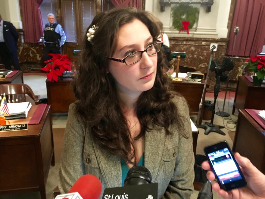 Alderman Megan Green speaks to reporters after Friday's Board of Aldermen meeting. The 15th Ward Democrat alleged that "bribes" were offed by a proponent of a riverfront stadium.