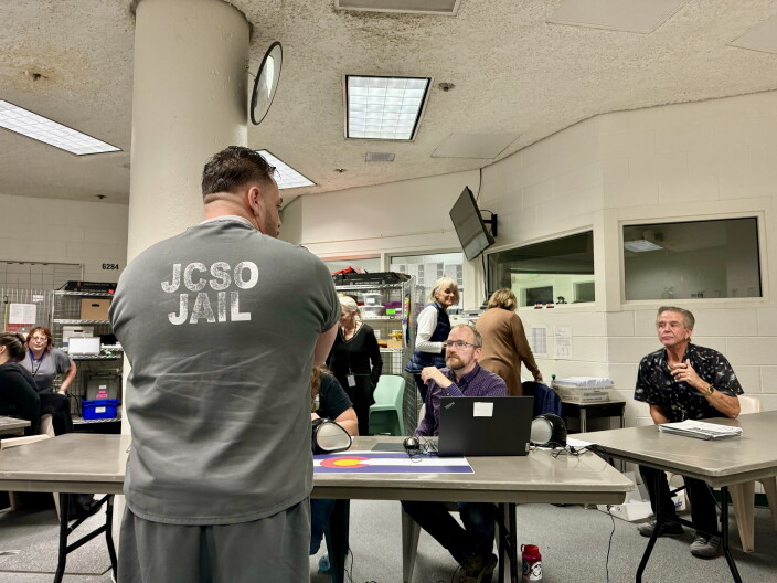 Election volunteers facilitate voting in the Jefferson County Jail.