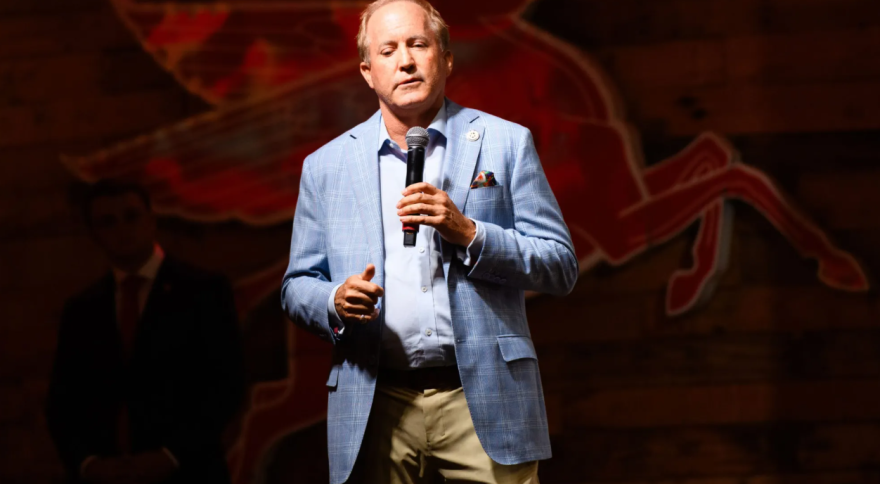 Texas Attorney General and U.S. Senate candidate Ken Paxton speaking at a Turning Point USA event at Cook's Garage in Lubbock on Oct 7, 2025.