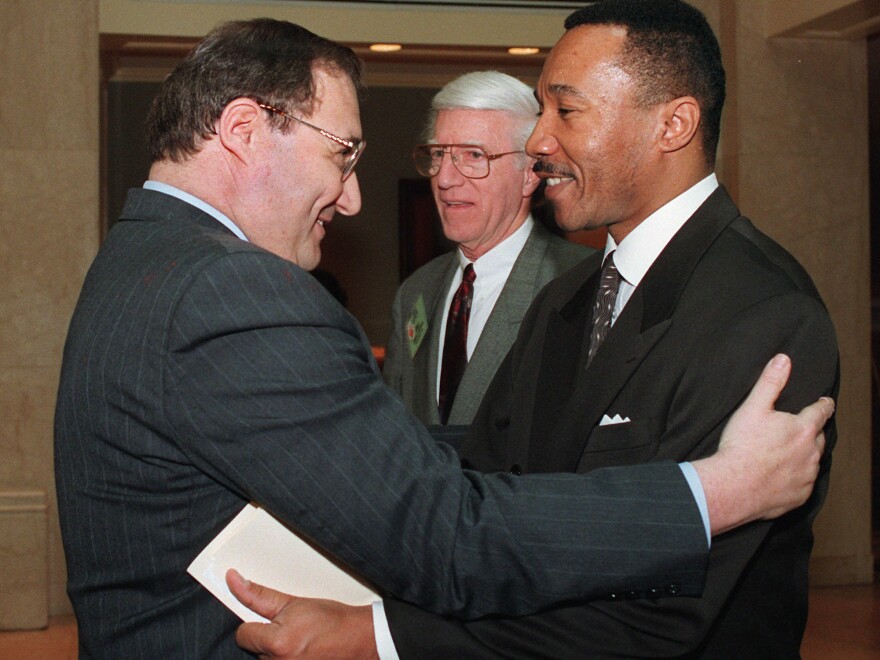 NAACP President and Chief Executive Officer Kweisi Mfume (right) embraces Anti-Defamation League National Director Abe Foxman in Washington prior to an April 22, 1996, discussion titled "Black/Jewish Relations and the Future of the East Civil Rights Movement." Foxman led the ADL from 1987 to 2015.