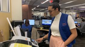 Sara Jampower sports her Technology Consultant vest during her shift at the University of Florida's Martson Science Library. (Maya Punjwami/WUFT News