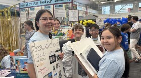 Bethel's 'Dirt Busters' robotics team at their booth at the WPI Waffle First League Lego event in Worcester, Massachusetts in June, 2026.