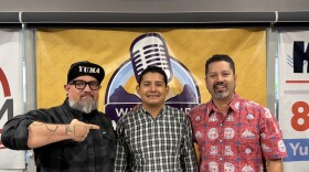 David Sanchez of the Friends of the Lower Colorado River cleanup group, center, with What's Up Yuma? Radio hosts Jonny Porter and Victor Calderón.