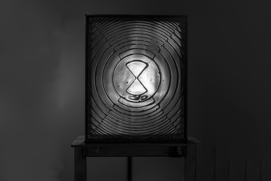 The exhibition taps into the survival nature of Fresnel lenses, which are commonly used to reflect light in order to signal for help.