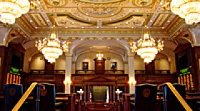 The Illinois House chamber uses a ventilation system that circulates air from columns in the chamber to the attic, where the air is filtered and dispersed over the lawmakers’ desks.