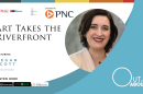 The image features a photo of this episode’s guest: Megan Scott, executive director of the Peoria Art Guild. The image features an all-capitalized text headline that reads “ART TAKES THE RIVERFRONT” with an underlying smaller text that reads “featuring Megan Scott, Peoria Art Guild.” The graphic artwork also features an icon of the podcast’s sponsor PNC Bank in the center with the WCBU and NPR logos in the left-hand corner. In the bottom right-hand corner are icons of the various podcast platforms where the Out and About podcast can be streamed/downloaded including Apple Podcasts, Spotify and Google Podcasts. In the bottom left-hand corner is Out and About spelled out in large, white graphic letters.