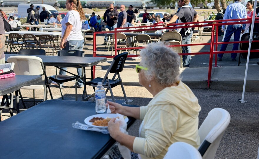 Volunteers serve meals at the Crossroads Rescue Mission's three days of Thanksgiving on November 25, 2025.