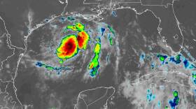 image of a tropical storm with a big red center