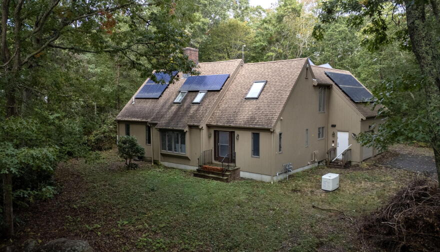 The building in woods in Falmouth, Mass. that will soon become the Green House Retreat for grieving families.