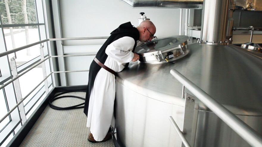 A monk at St. Joseph's Abbey inspects the boil.