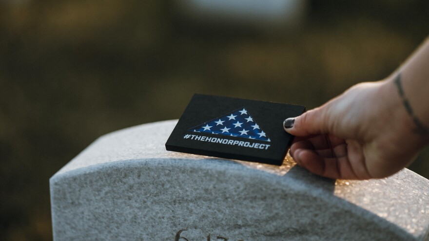 These Flags of Valor commemorative tokens will be placed atop the tombstones of those buried at he Jacksonville National Cemetery on Memorial Day.