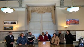CPS board members and city officials meet in Mayor John Cranley's office to announce a tenative agreement on the issue of tax abatements, which the two parties had struggled with for the better part of a year.