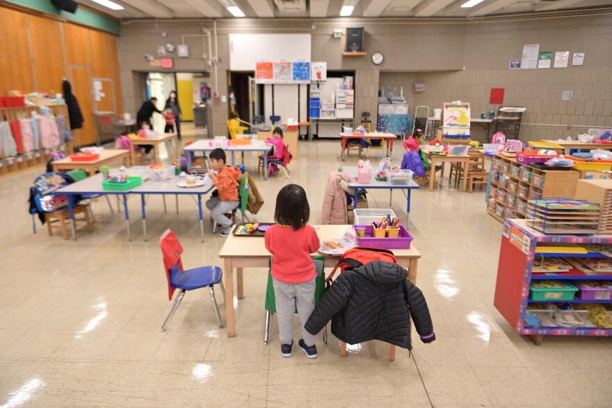 Students attend a pre-K class at P.S. 124 in New York City on Jan 13, 2021. A new report found enrollment drops at state-based preschool programs during the 2020-2021 school year.