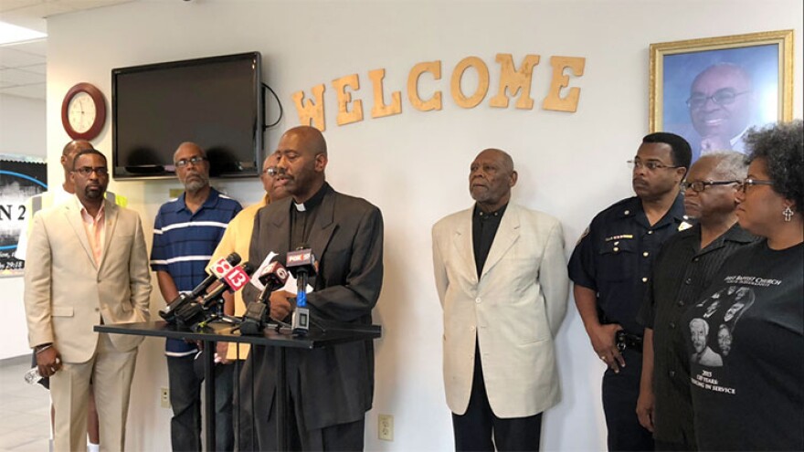 Rev. Charles Harrison speaks during a press conference Wednesday afternoon.