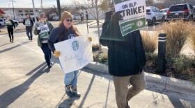 Starbucks workers strike in Oklahoma City at 23rd Street and Robinson Avenue on Dec. 18, 2022