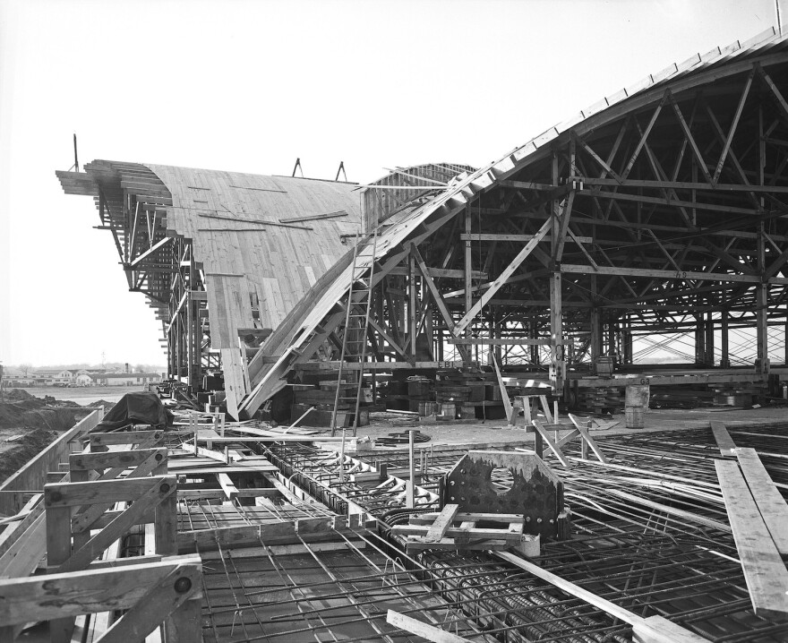 Construction of the terminal designed by Minoru Yamasaki began in 1953. This photo shows the wooden framework that workers constructed before pouring the concrete to make the thin-shell concrete structure.