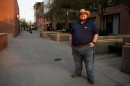Giles Sims, who is getting a 90-hour bachelor of applied science in communication from Ensign College poses for a portrait on campus in Salt Lake City, Aug. 6, 2026, in Salt Lake City.