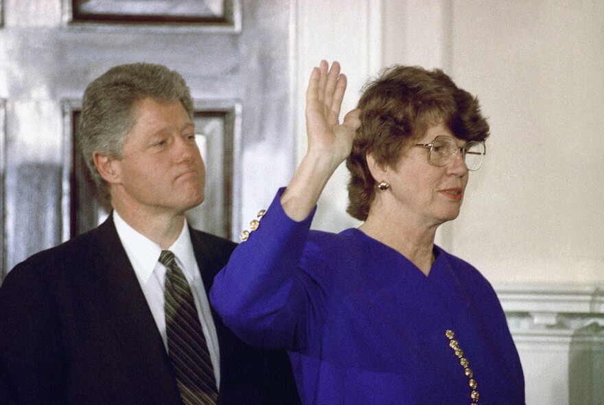 Janet Reno takes the oath as attorney general during a ceremony at the White House on March 12, 1993, while President Bill Clinton watches.
