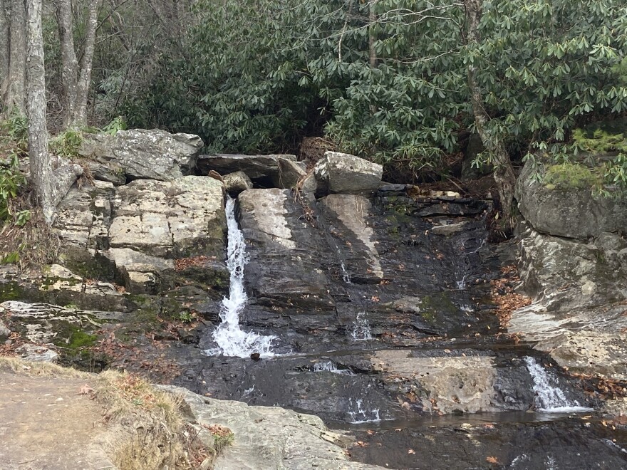 A creek spills over a small waterfall in Avery County. PAUL GARBER/WFDD