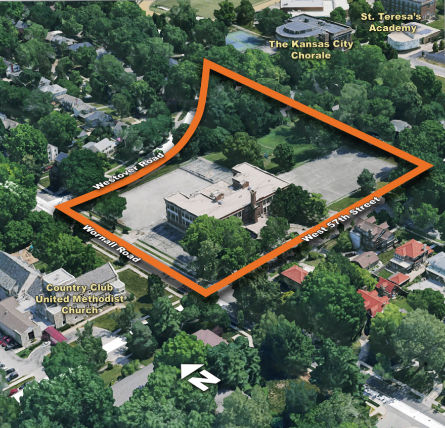 An aerial view of the Bryant School property site outlined in orange.