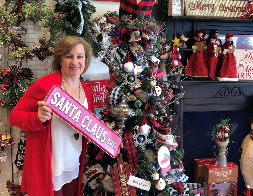 Peggy Parker standing in store