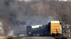 Smoke rises from a derailed cargo train in East Palestine, Ohio.
