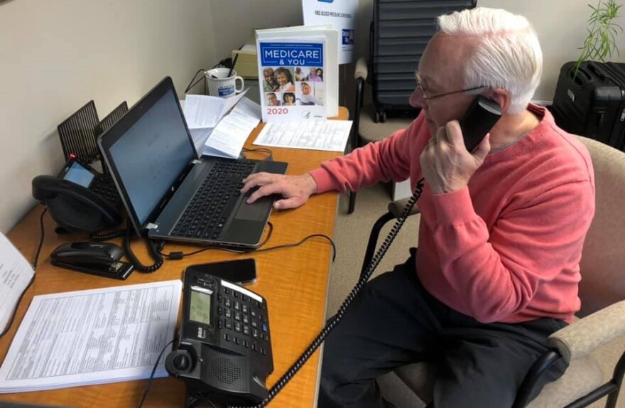 Rick Lynch, a volunteer navigator with United Way of Lackawanna, Wayne and Pike counties, makes calls as part of the Older Adult Isolation project.