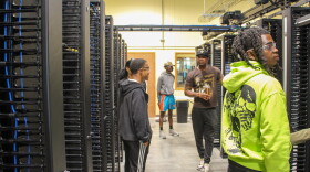 A mini data center at Louisiana Delta Community College where students practice laying fiber and setting up servers.