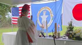 Yoshinobu Miyake of the Konko Church of Kasugaoka performs a Shinto prayer at a joint memorial service to honor the lives lost during World War II on Saipan.