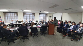 Cam Hardy of the Better Bus Coalition takes the lecturn to encourage SORTA to back a resolution to fund Metro, Cincinnati's bus system.