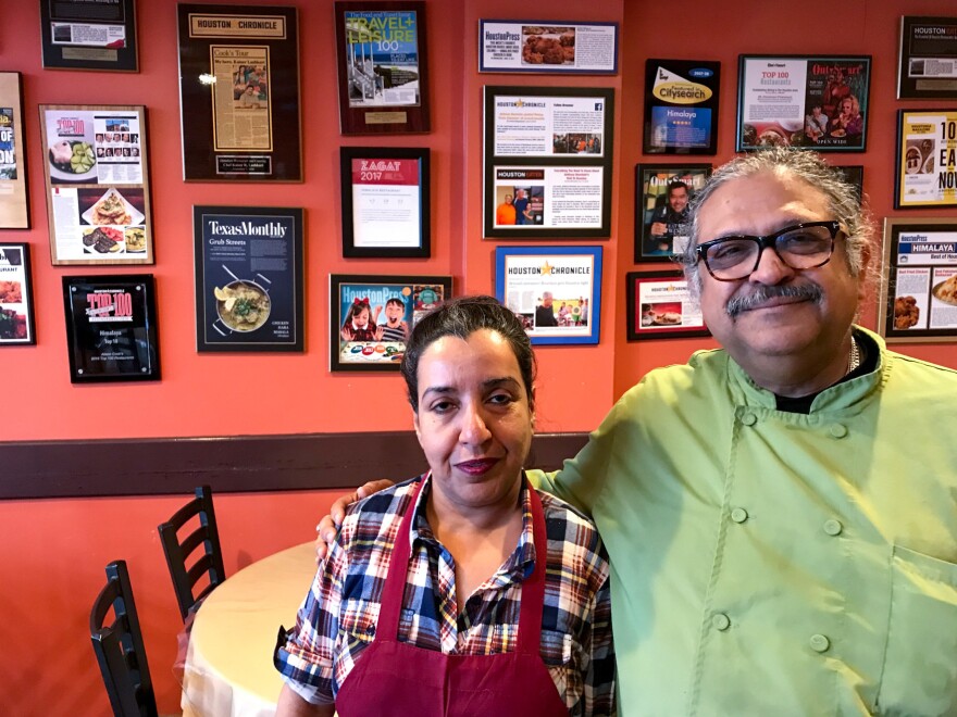 Lashkari went to medical school in Pakistan for several years before realizing his true passion was cooking. He's shown here with his wife, Azra Babar Lashkari.