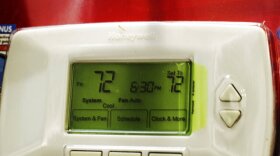 In this July 24, 2009 file photo, shows a Honeywell thermostat, for sale at a hardware store in Palo Alto, Calif.
