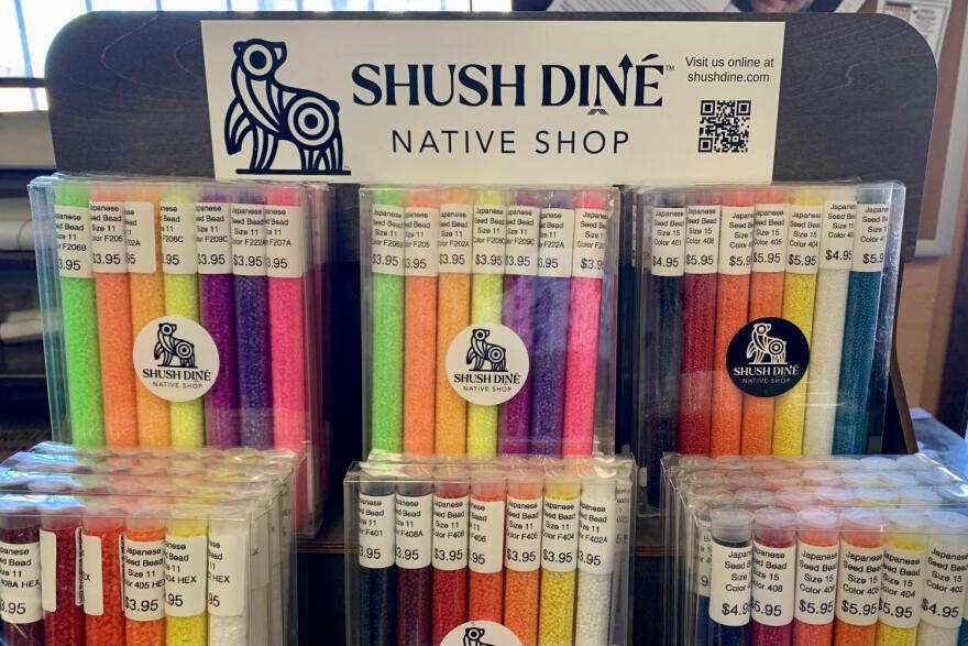 A cart containing beading-related products from Reva Stewart's newly-launched Shush Diné Native Shop sits inside Drumbeat during the final sale.