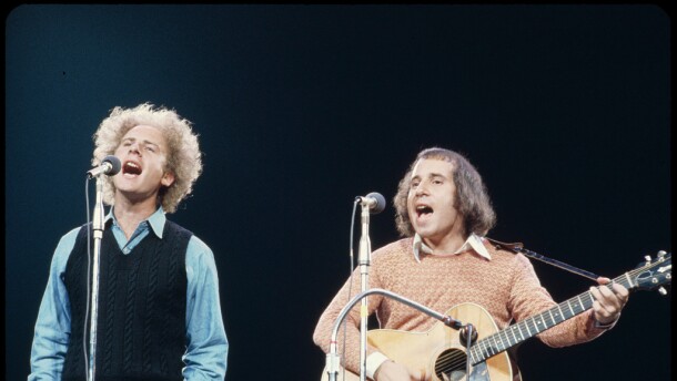 Simon & Garfunkel, photographed while performing in 1965 by Bernard Gotfryd.
