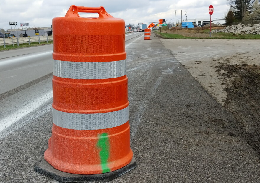 An orange barrel sits alongside SR 32 in Clermont County.