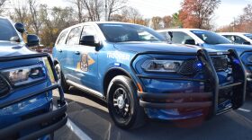 New two-tone blue-and-white Indiana State Police patrol vehicles sit ready for deployment on Wednesday, Nov. 12, 2025, in Indianapolis.