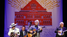 FILE - Del McCoury, center; Bobby Osborne, left; and J. D. Crowe, right; perform at the International Bluegrass Music Association Awards show on Thursday, Sept. 27, 2012, in Nashville, Tenn. Influential Bluegrass musician J.D. Crowe died early Friday, Dec. 24, 2021 his family announced on social media. The Lexington, Kentucky, native was 84. No cause of death was given.(AP Photo/Mark Humphrey, File)