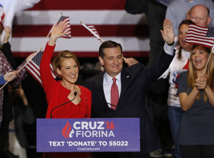 Carly Fiorina and Ted Cruz wave to an Indianapolis crowd after Cruz announced that Fiorina will be his running mate — if he wins the nomination.