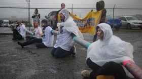 Maru Mora Villalpando, far right, joins a 2014 protest outside the Northwest Detention Center in Tacoma. 