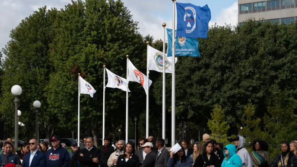 Tribal flags for six of the 11 tribal nations of Minnesota who will be permanently recognized at the state Capitol grounds wave during the Tribal Flag Plaza flag-raising ceremony in St. Paul | MPR News