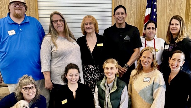 The Stronghold staff — Candice Ojeda and Jansen Harrington, back row, second and third from right — join other community nonprofit organizations at OregonServes' recent 25-26 AmeriCorps State Grantee Orientation, in preparation to launch the first Oregon Youth Mental Health Corps program this fall.
