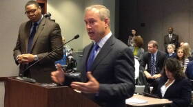 Jonathan Hage, Charter Schools USA CEO, talks to the State Board of Education on Wednesday, Feb. 4, 2015 at the Indiana Government Center, while Indianapolis Public Schools Superintendent Lewis Ferebee listens.