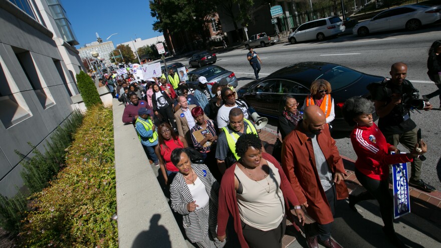 Democratic Georgia gubernatorial candidate Stacey Abrams and Grammy-winning artist Common lead voters during a "Souls to The Polls" march in downtown Atlanta on Oc. 28. The march went from Underground Atlanta to the Fulton County Government Center polling station open for early voting.