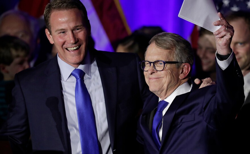 Lieutenant governor-elect Jon Husted and governor-elect Mike DeWine celebrate at the Ohio Republican Party event, Tuesday, Nov. 6, 2018, in Columbus, Ohio.