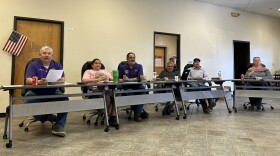 Marfa City Council members listen to public comments about local housing issues at a meeting on April 11, 2023.