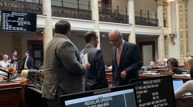 Kentucky Senate Budget Committee Chair Chris McDaniel speaks with fellow northern Kentucky Senator John Schickel