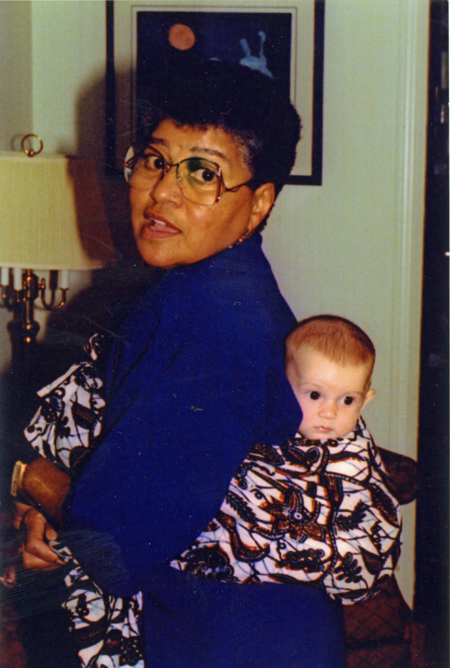 Lucienne Sanchez with her granddaughter Beth Fleming in 1997, using the same handmade African cloth sling that carried her son decades earlier.