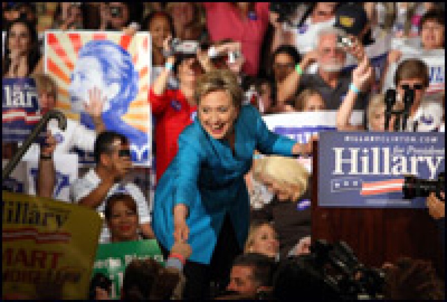 New York Sen. Hillary Clinton greets supporters as she arrives at a primary-night party on June 1 in San Juan, Puerto Rico.