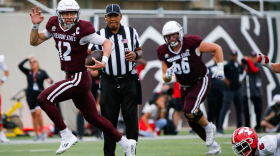 Former Quarterback, jacob Clark speeds past on the field in a game against Youngstown State, 2024