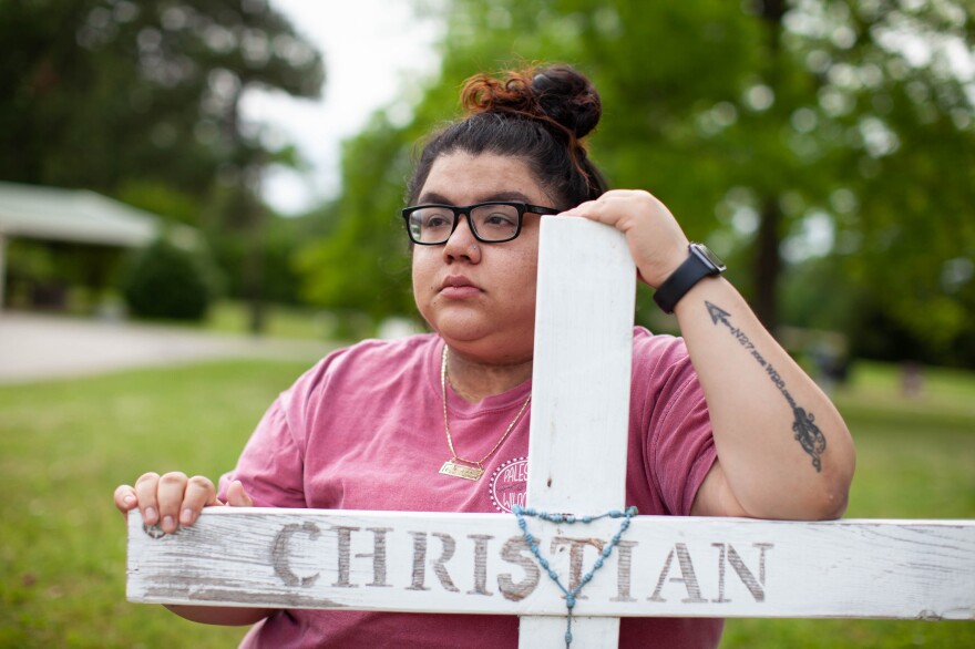 Christian's body was found by border agents. He was buried, like other migrants, as John Doe in Sacred Heart Cemetery. Zaira Gonzalez has tattooed on her left forearm the coordinates where Christian's body was discovered by border agents.